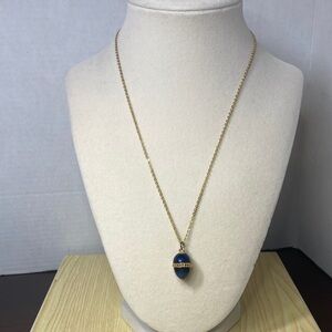 Elegant Gold Tone and Blue Egg Pendant Necklace